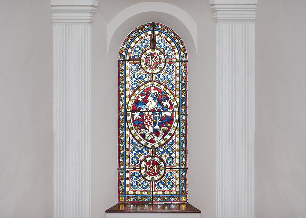 Stained glass with the Blake family crest